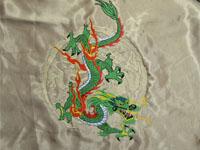 Машинная вышивка дракона